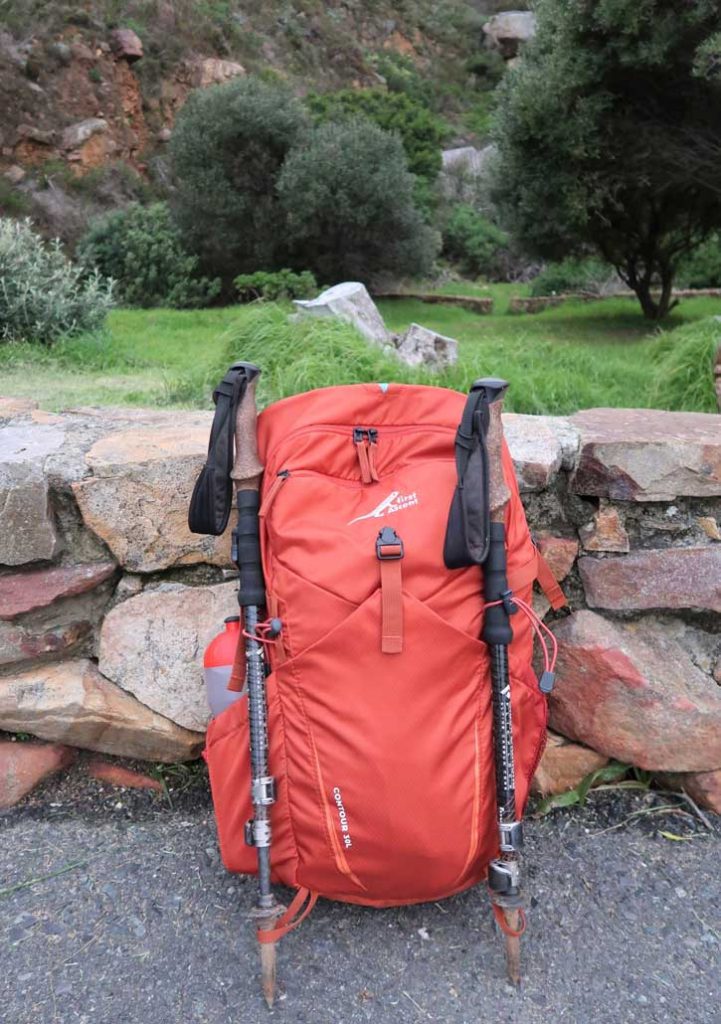 First Ascent Contour 30l backpack with trekking poles
